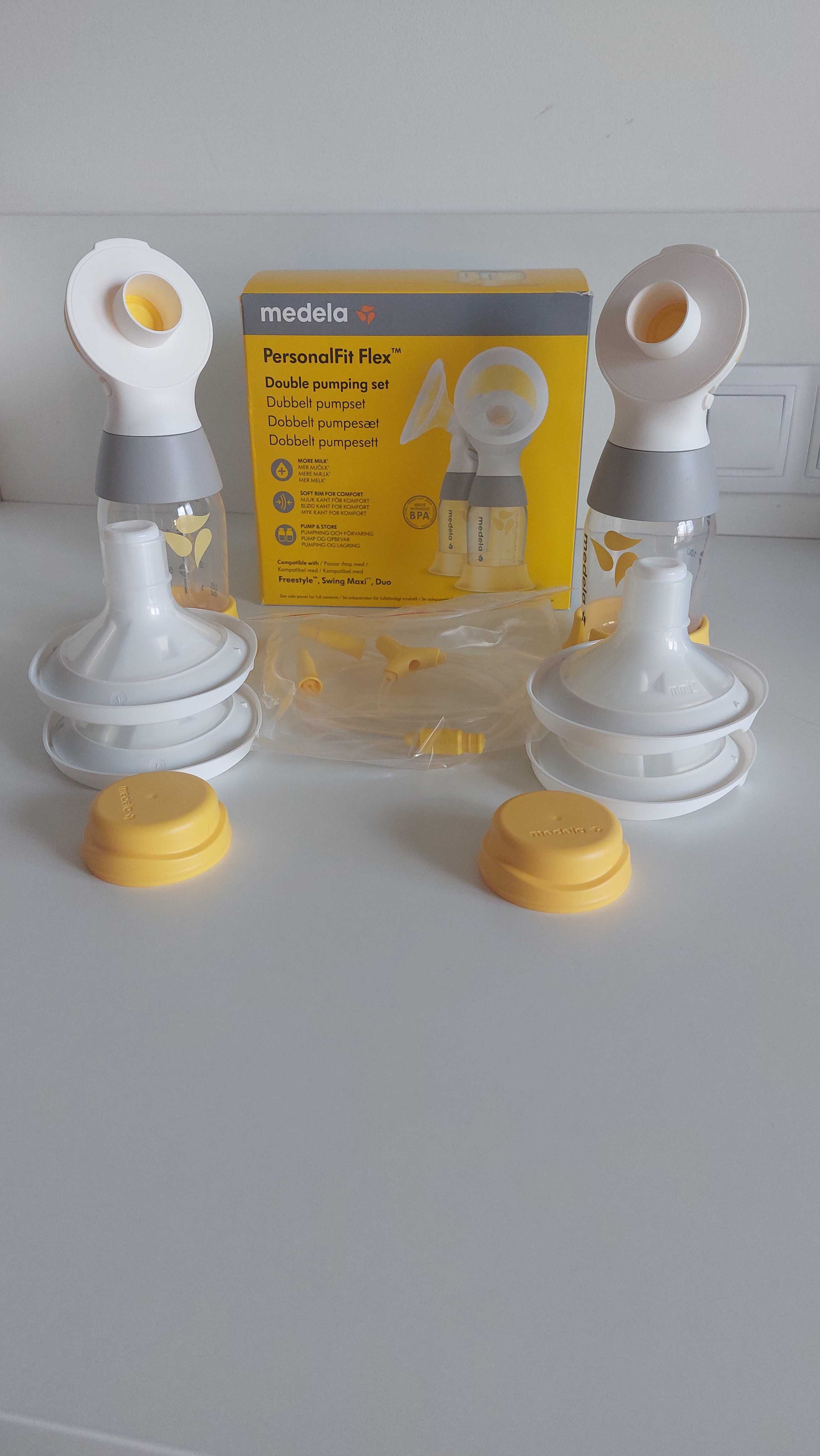 Двойна двуфазна помпа Medela Swing Maxi + допълнителни аксесоари