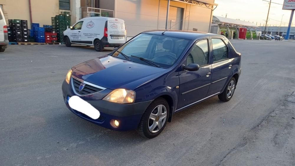 Vand dacia logan full  16 benzina km 100314 reali  merge ca noua