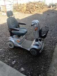 De vînzare cărucior electric pentru persoane cu dizabilități.