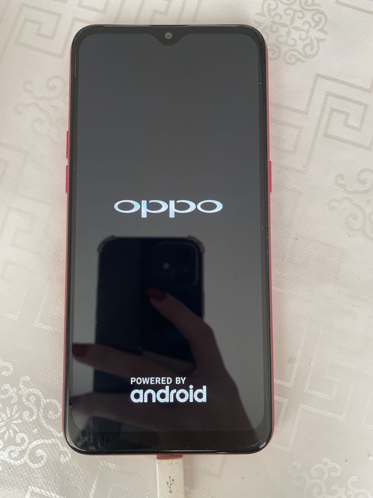 OPPO A1k телефоны