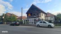 Spațiu comercial + apartament, de vânzare în Curtea de Argeș.