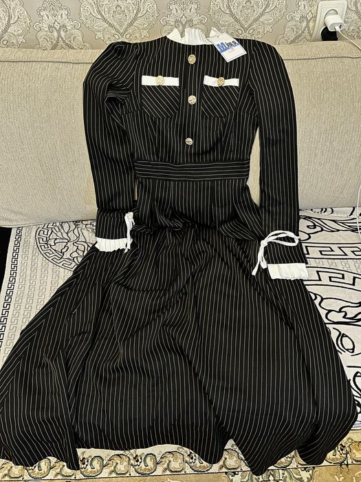 Новое платье с этикеткой