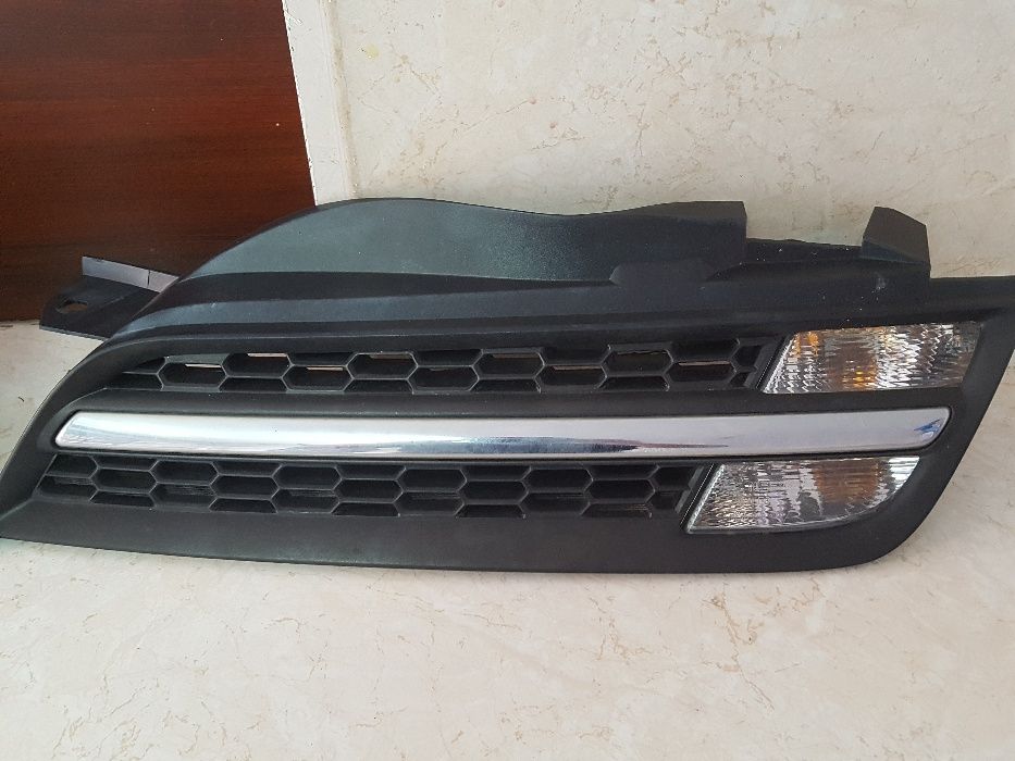 Нисан Микра К12 решетка