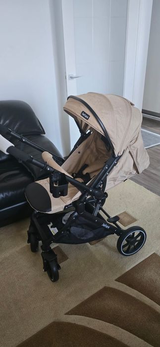Коляска новая от 0-4 лет.