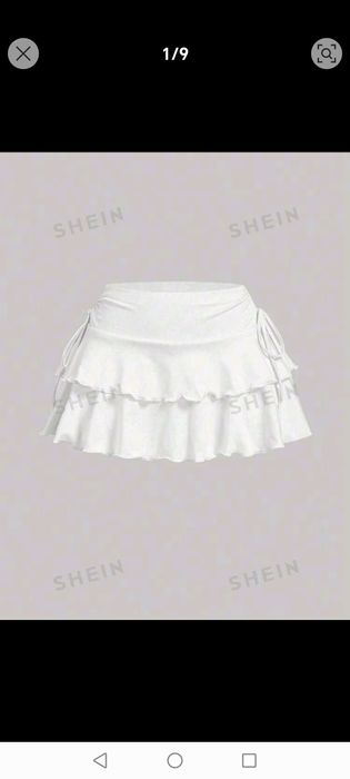 Fusta alba cu pantalon