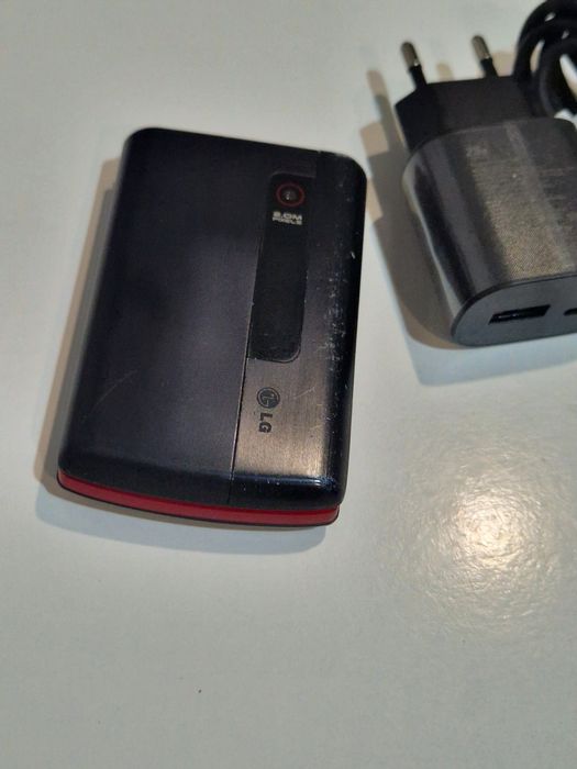Super telefon Lg cu clapeta cu adaptor original