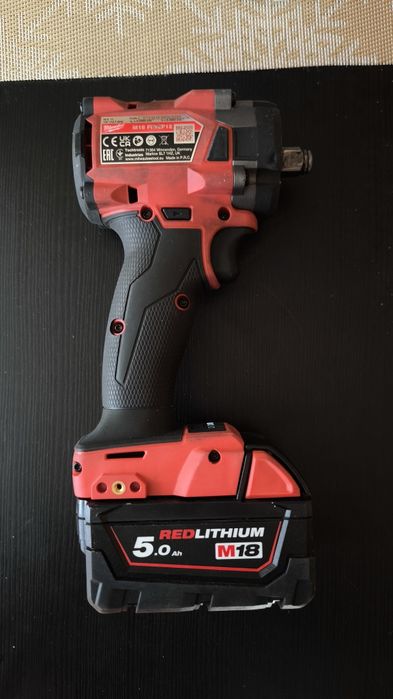 Pistol impact Milwaukee M18 FUEL  + baterie 5.0Ah ca nou!