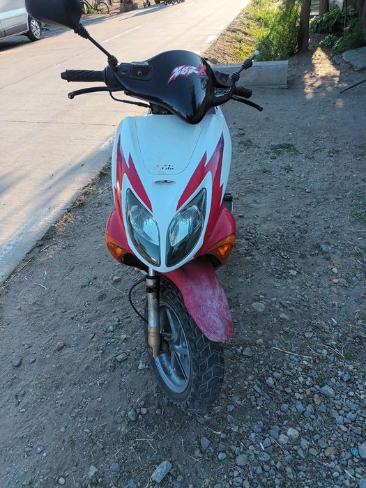 Vând scuter  honda