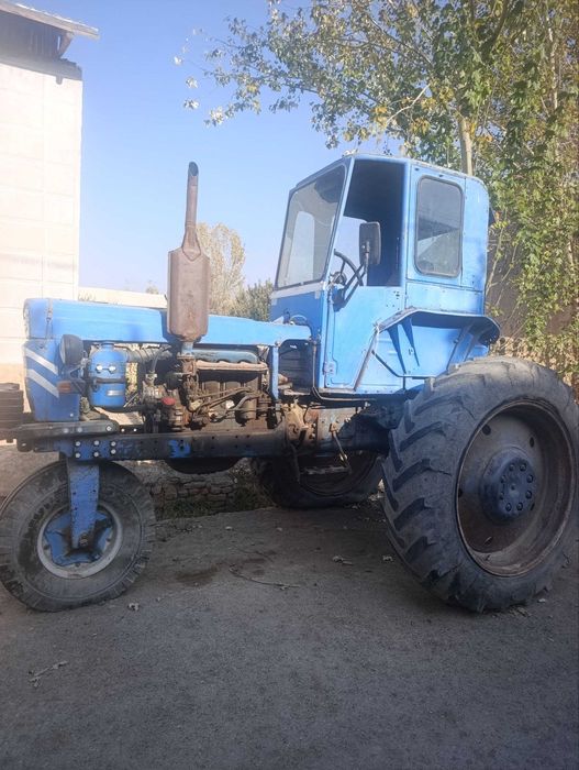 T 28 traktor kafolati bilan...