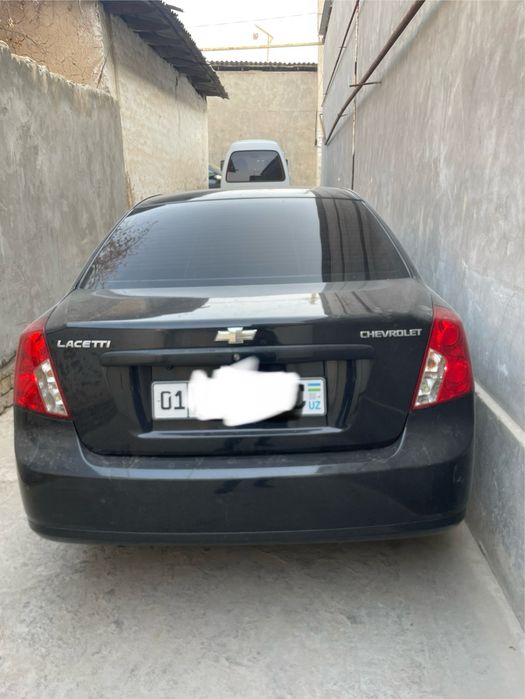 Lacetti 1.8 2010 yil qora 157.000 probeg