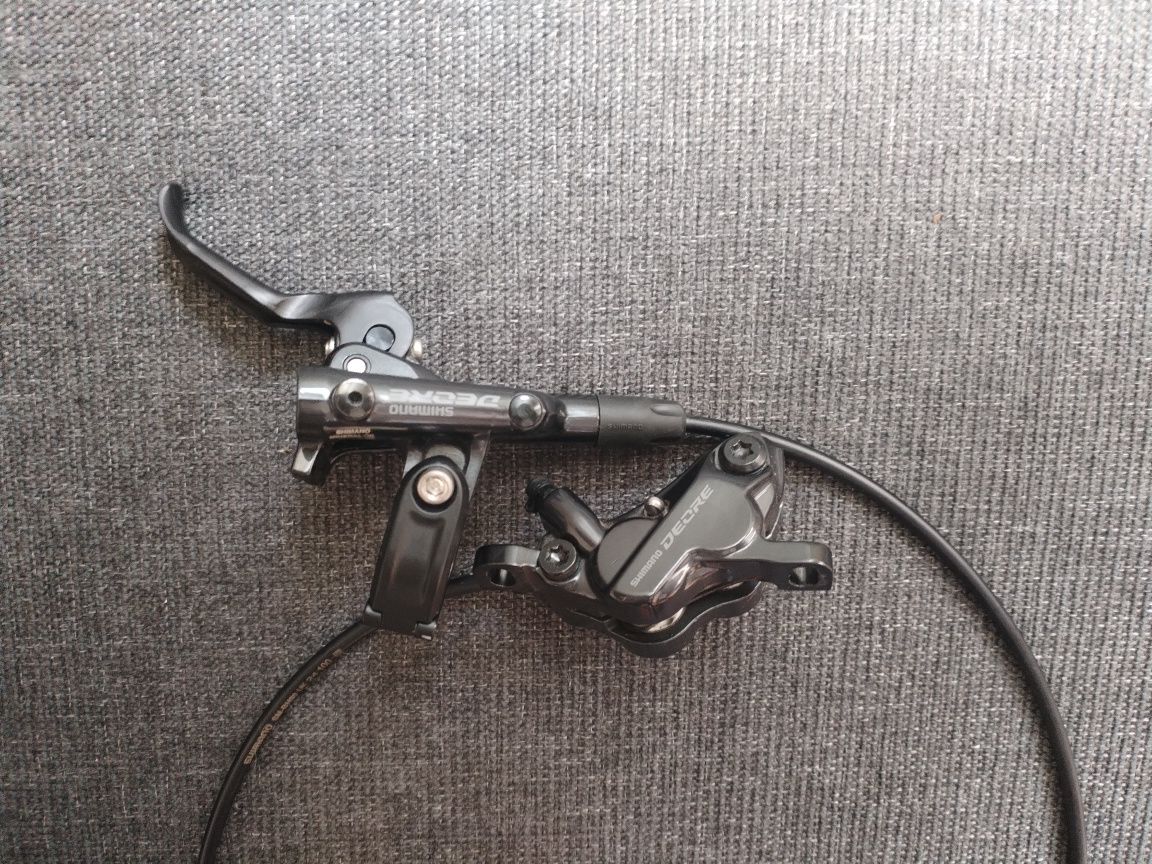 Set frane SHIMANO DEORE ( 4 pistoane și 2 pistoane )