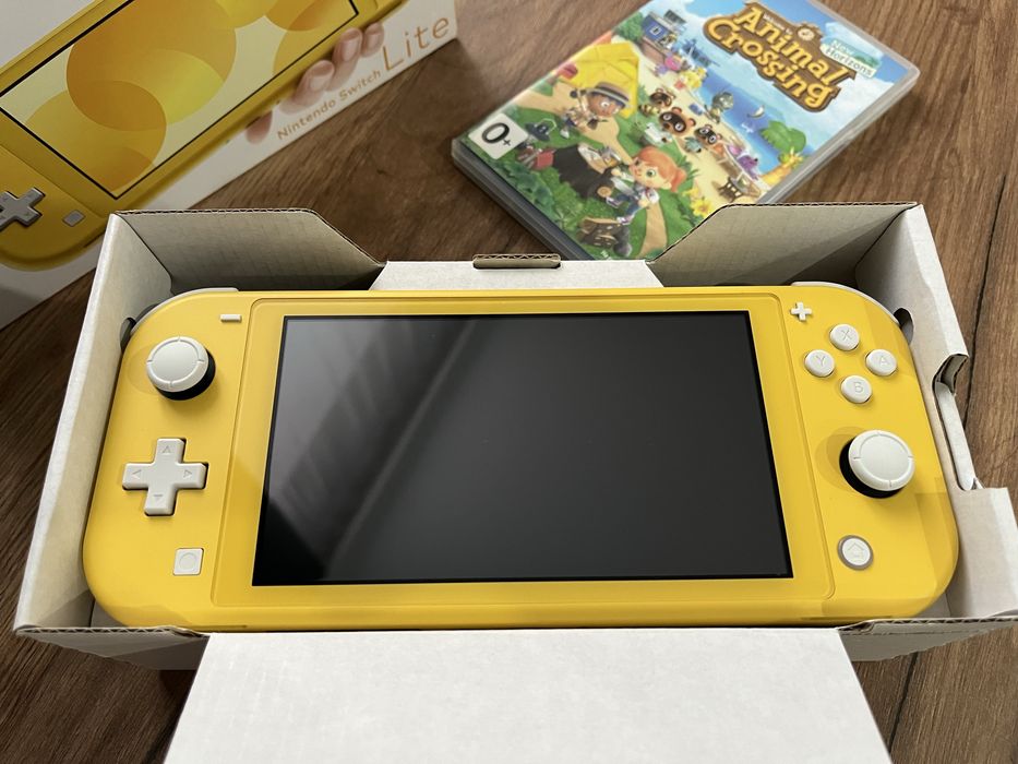 Продам Nintendo Switch Lite + игру Animal Crossing