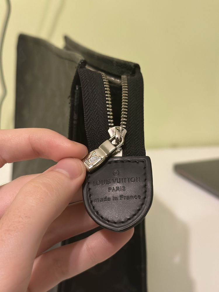 Louis Vuitton clutch unisex