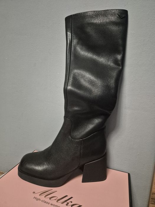 Продам новые сапоги