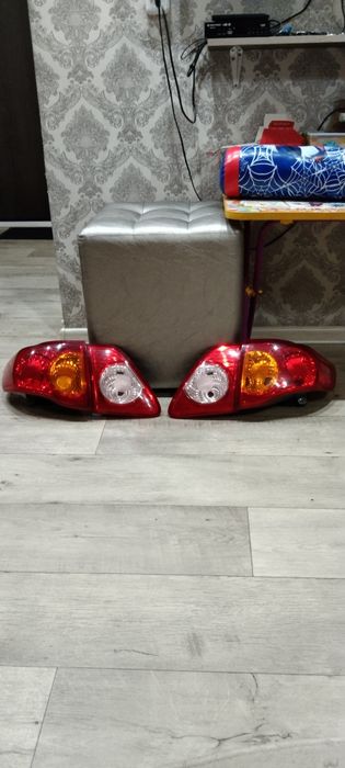 Продам фонари задние в комплекте Тойота Королла 150.Оригинал.