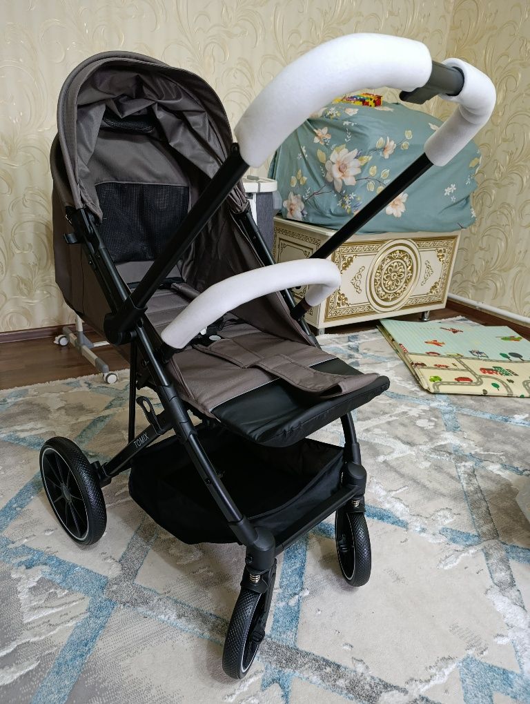 Продам новую коляску в упаковке Tomix Kelly!