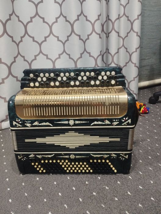 Баян Беларусь,в отличном состоянии.