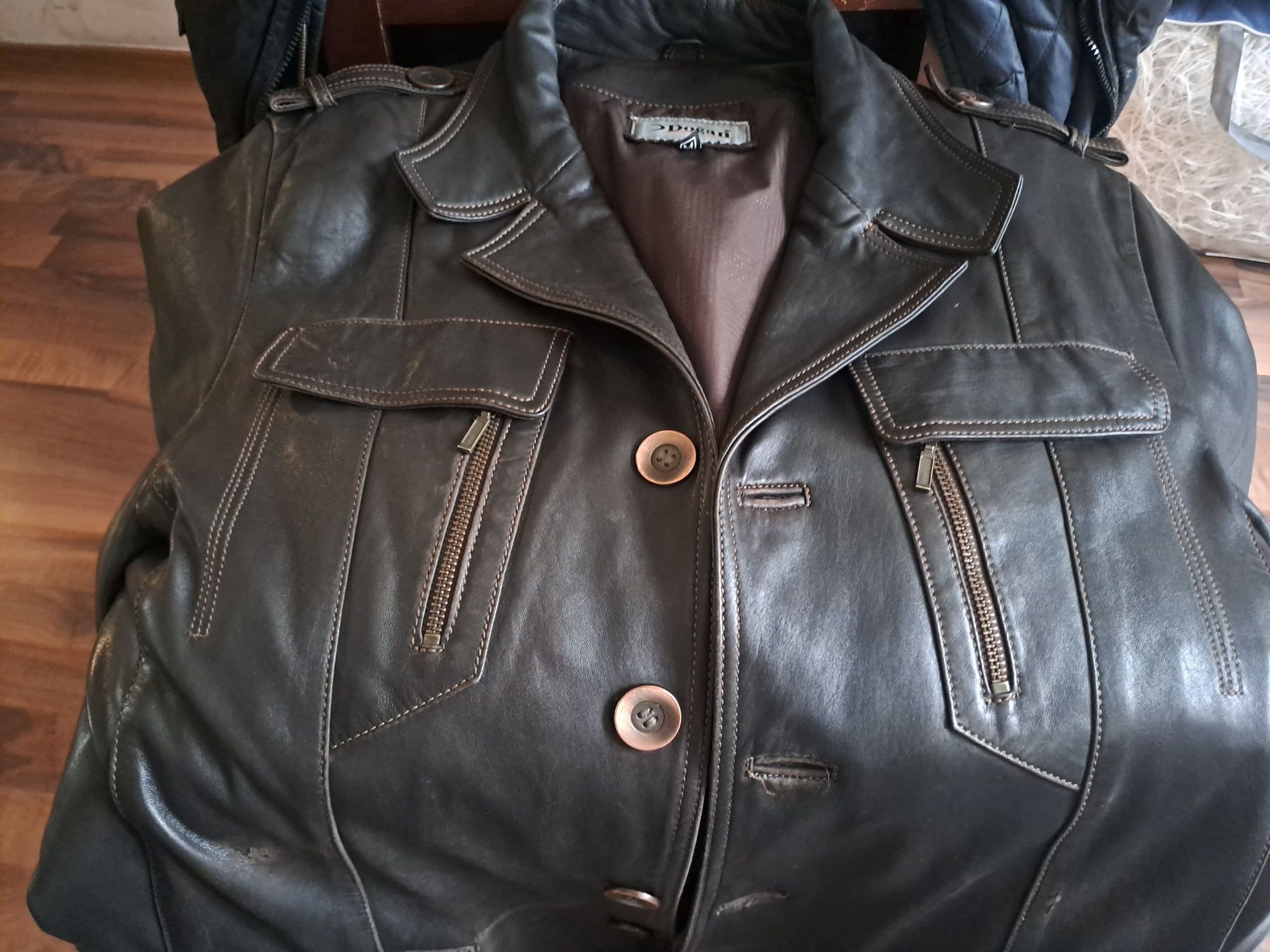 Продам мужской кожанный куртку итальянской коречного цвета.Размер 50-5