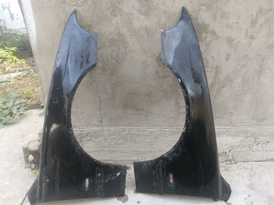 Продам крылья от бмв Е39
