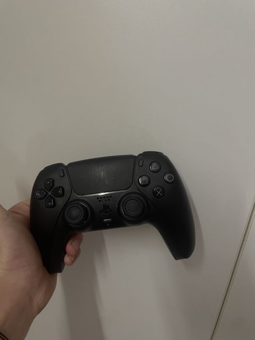 Vand maneta de PS5
