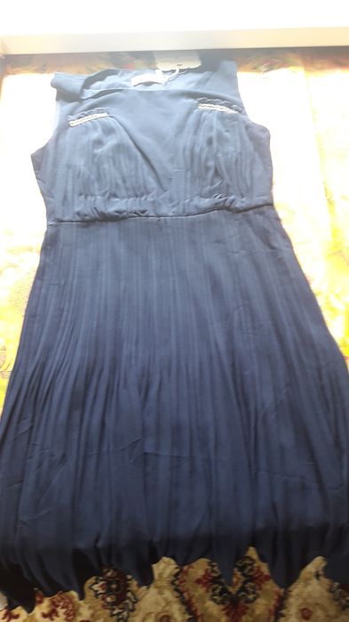 Платье новое ни разу не носили