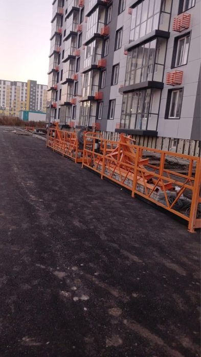 Фасадный подъемник люлька