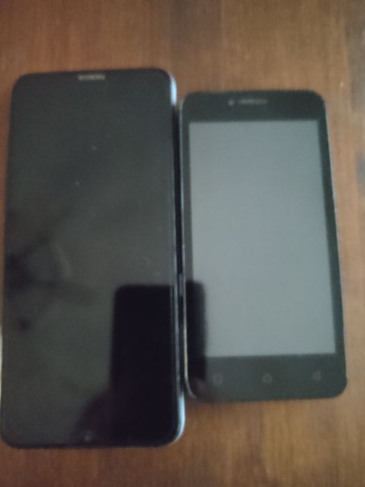 Телефони за части