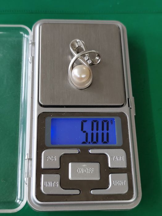 Сребърен медальон с перла 925