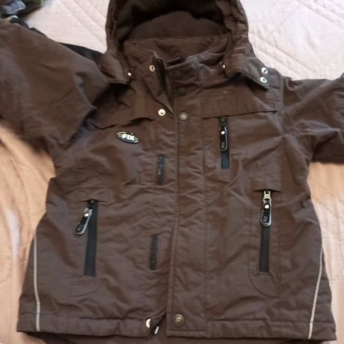 Детско яке дължината се вижда на рулетката.