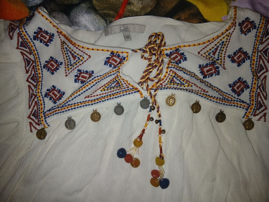 ie cu bănuți Regina Elisabeth