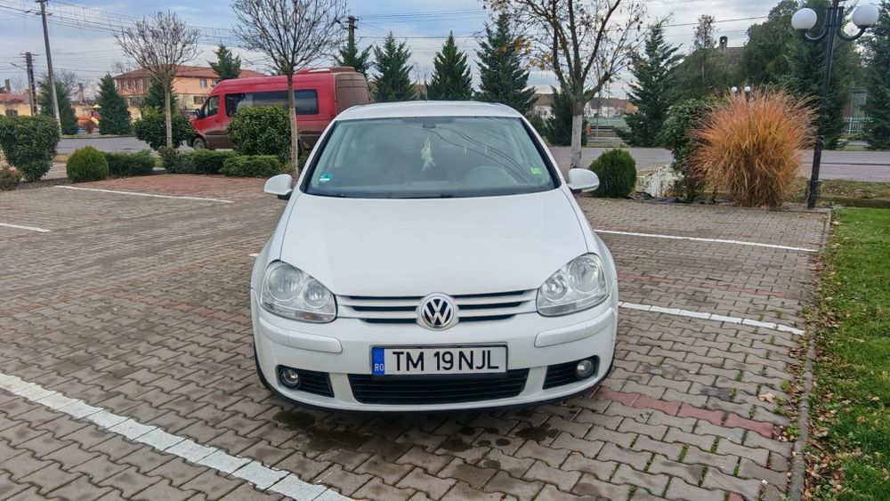 Vw golf 5 an 2009  1.4 benzina