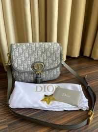 Сива чанта Dior.