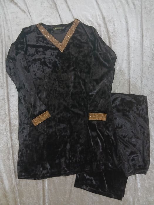 Куйлак иштони билан.