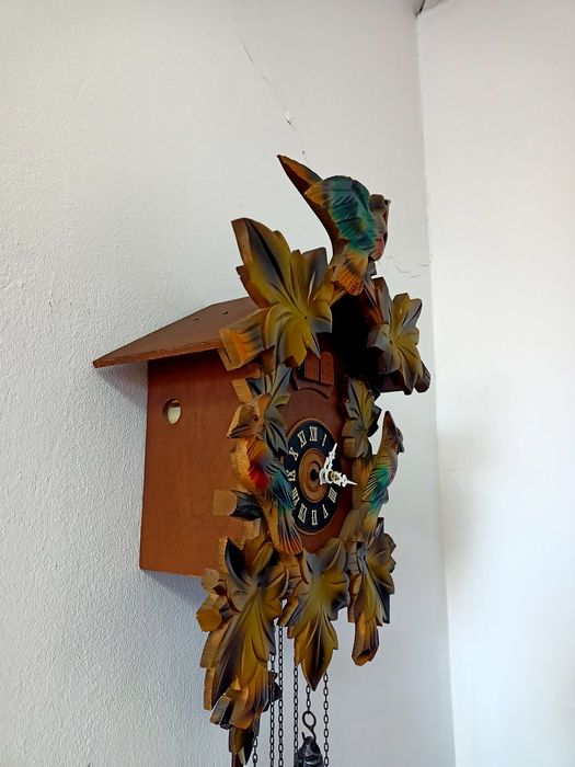 Ceas mecanic cu cuc și tambur muzical