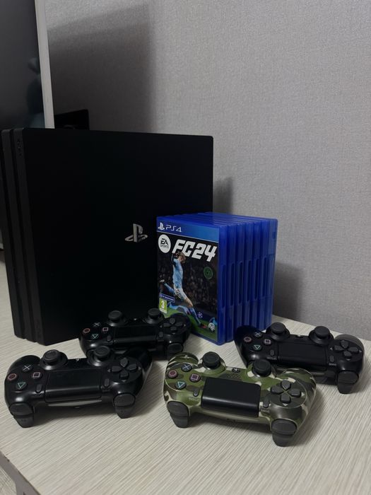 PlayStation 4 Pro + 4 джойстика и 7 игр