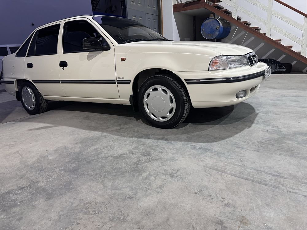 Завод холатда nexia 1 сотилади 2007 сонс люкс кандер