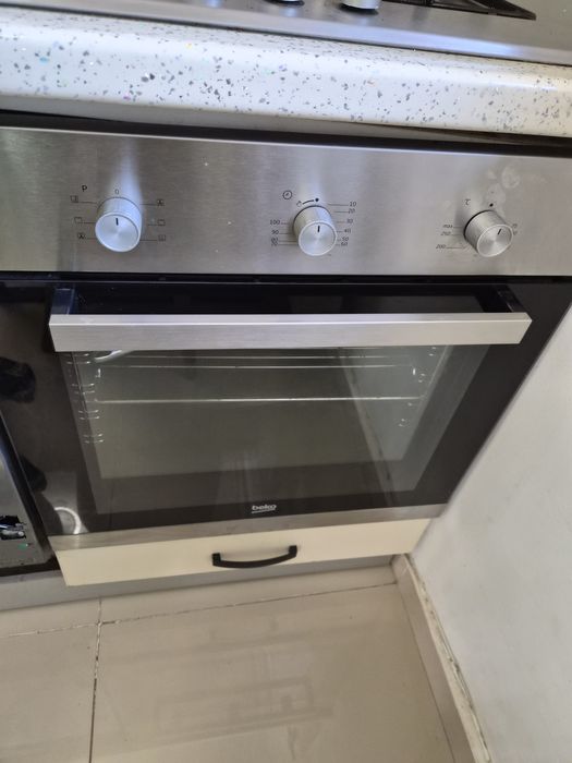 Cuptor electric plus plita pe gaz Beko