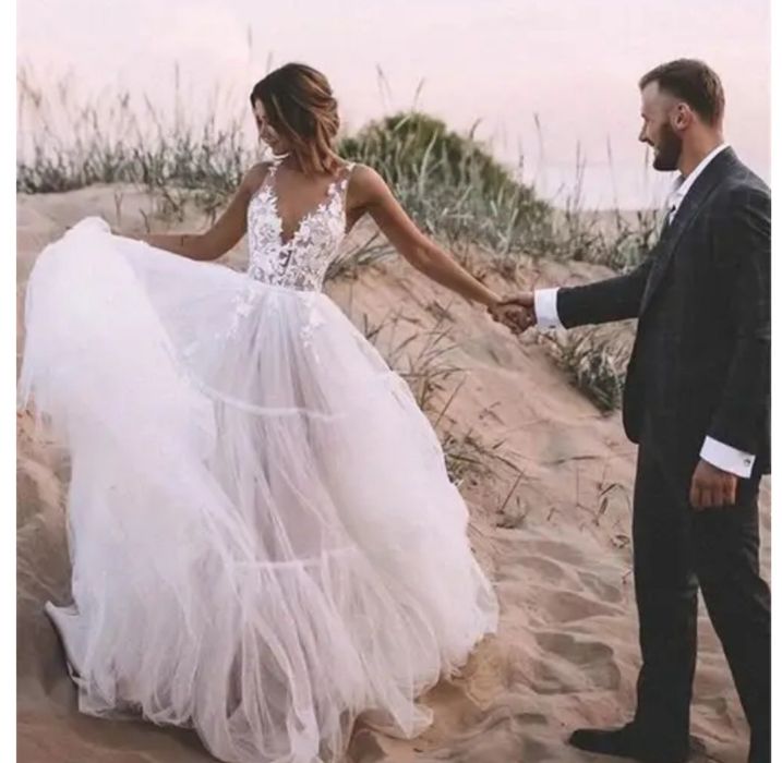 Продам свадебное новое платье р 42_44 новое 100000 тг