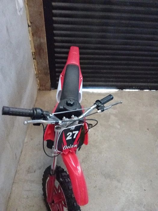 Motocicleta rosie pentru copii cu motor de 50cc