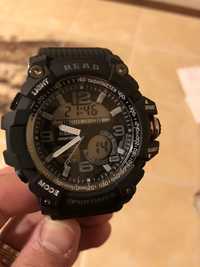 Vand ceas tip g shock pe negru si pe verde