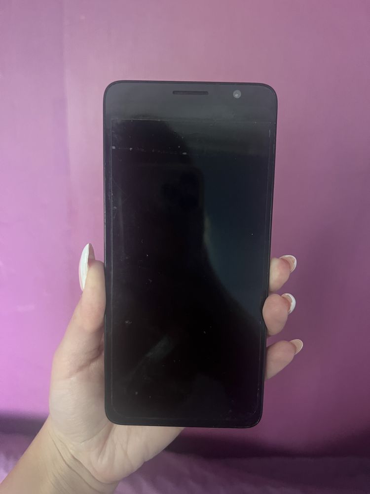 Телефон TCL 501.