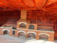 Grătar zidit pentru grădină – model rustic