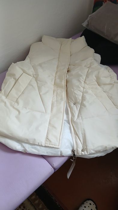 Безрукавка тёплая модная