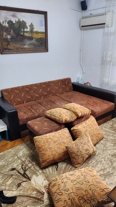Canapea extensibila cu lada de depozitare