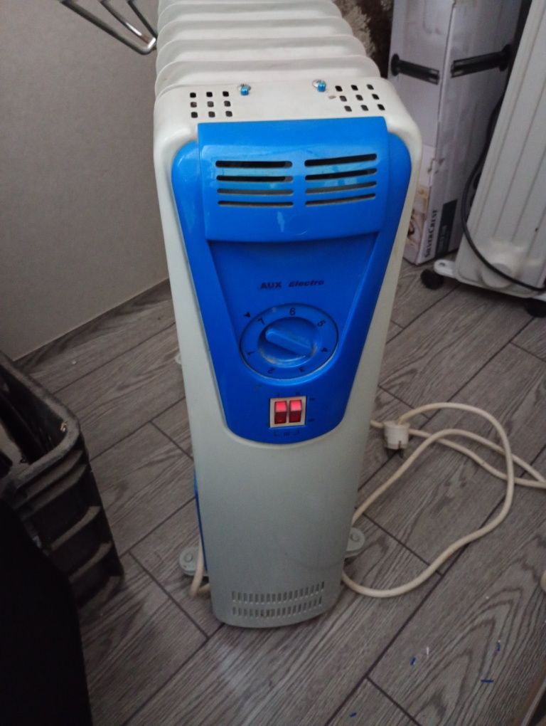 Vând 2 calorifere electrice pe ulei