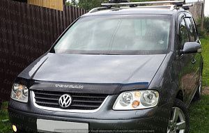 Covorase auto VW Touran din cuciuc ,husa capota ,pleoape de faruri,defector capota