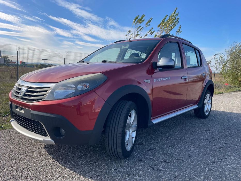 Dacia Sandero 1.6 benzină 2011 Ac 212000 km rosie cutie manuala 84 cp