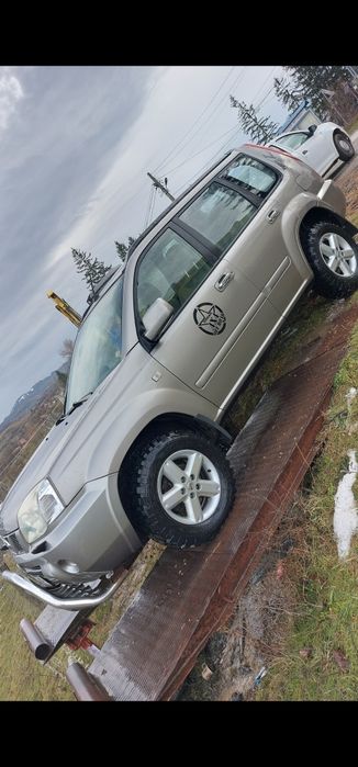 Nissan x trail 2006        ( schimb cu basculabila sau escavator )