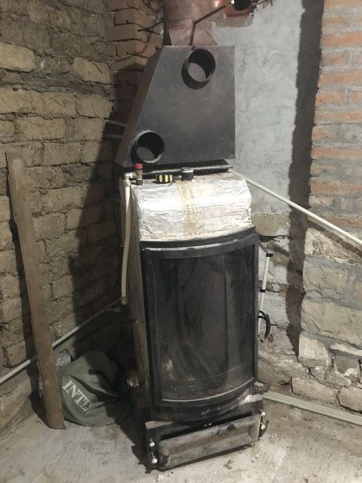 камина за локално парно с водна риза и въздуховоди