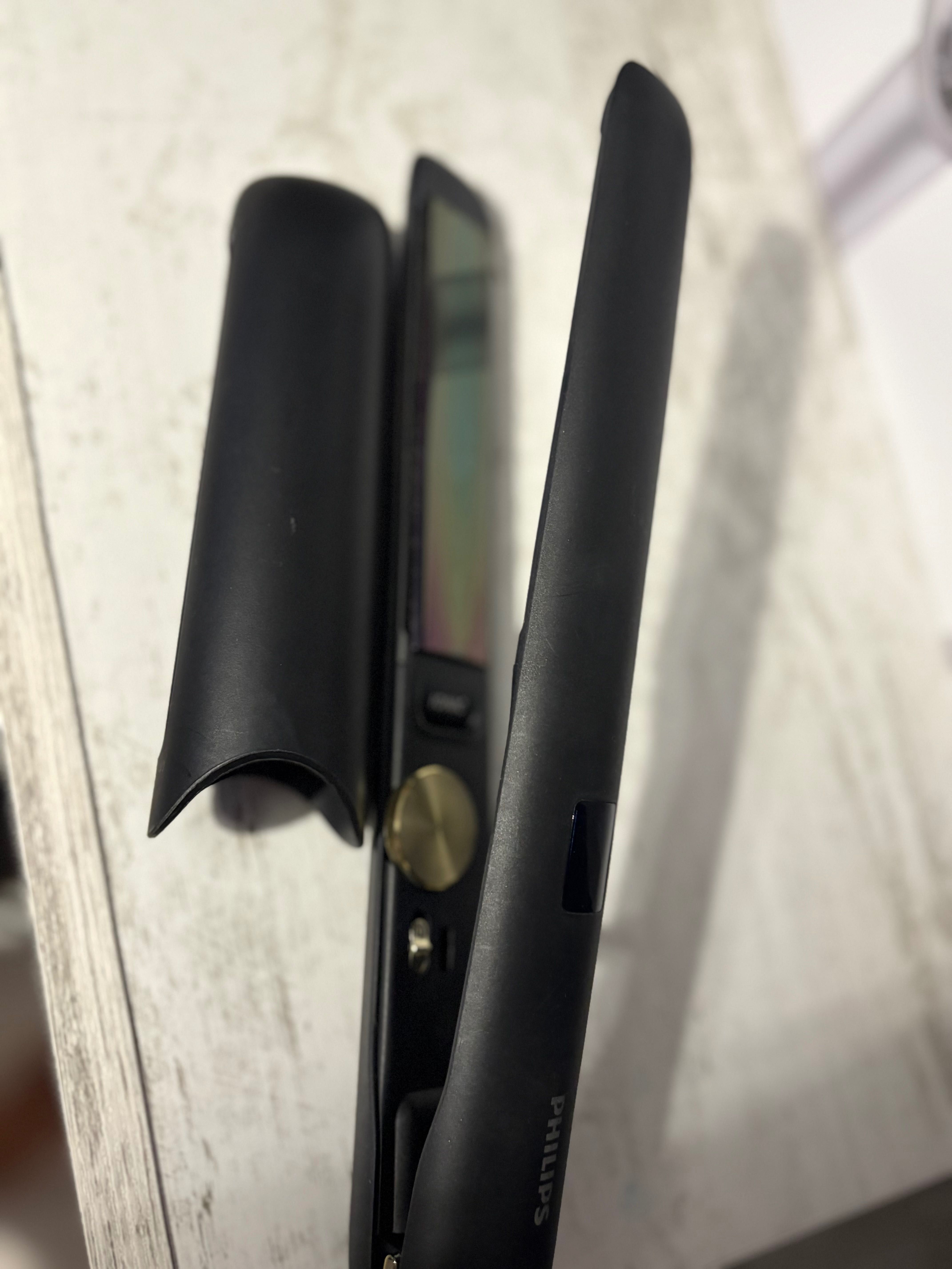 Професионална преса за коса Philips HPS930/00, Йонизираща функция